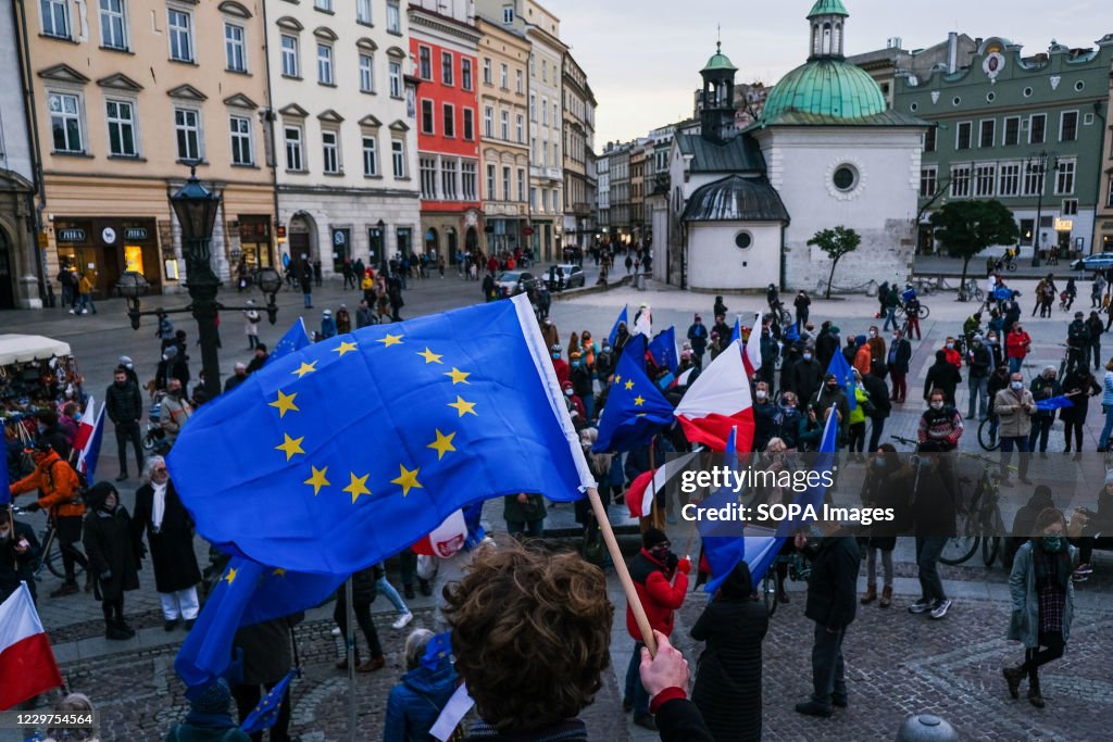 A protester holding a European Union flag during the...