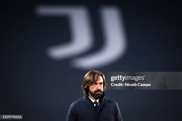 Andrea Pirlo, head coach of Juventus FC, looks on during warm up prior to the UEFA Champions League Group G football match between Juventus FC and...