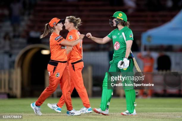 Nat Sciver of the Melbourne Stars fist pumps a Perth player after winning the match during the Women's Big Bash League semi final cricket match...