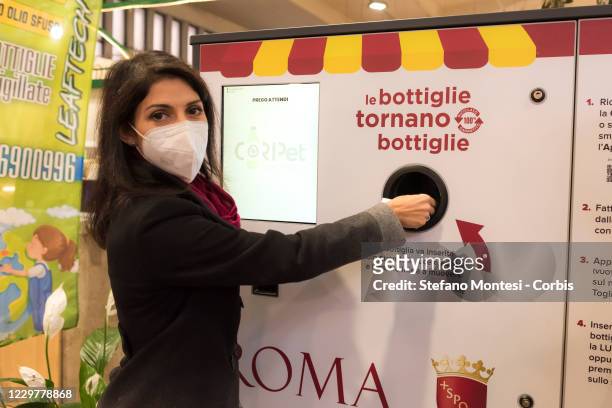 The Mayor of Rome Virginia Raggi launches a new plastic recycling machine as part of a new initiative at Mercato Tuscolano III on November 25, 2020...