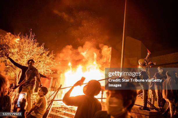 Minneapolis, MN May 28: The Minneapolis 3rd Police Precinct was set on fire by protesters after being evacuated on Thursday night.