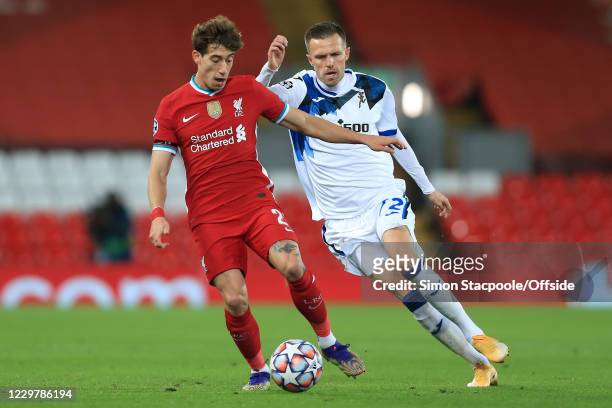 Kostas Tsimikas of Liverpool and Josip Ilicic of Atalanta during the UEFA Champions League Group D stage match between Liverpool FC and Atalanta BC...