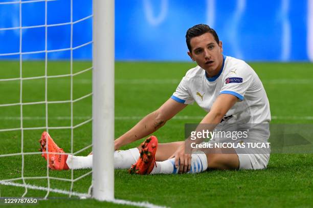 Marseille's French forward Florian Thauvin reacts after missing a goal opportunity during the UEFA Champions League Group C second-leg football match...