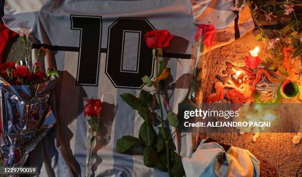 View of an improvised altar set up by Fans of Argentinos Juniors' football team where Argentinian football legend Diego Maradona used to play outside...