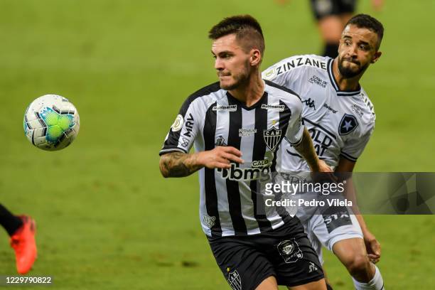 Nathan of Atletico MG and Caio Alexandre of Botafogo fight for the ball during a match betwee Atletico MG and Botafogo as part of Brasileirao Series...