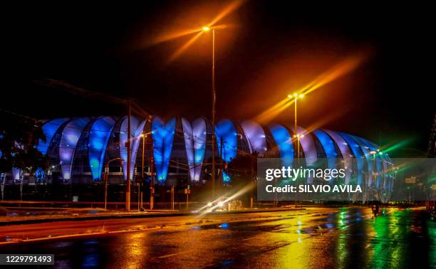 View of the Beira-Rio stadium of Sport Club Internacional lit with the colours of the Argentine flag in honor of Argentinian player Diego Armando...