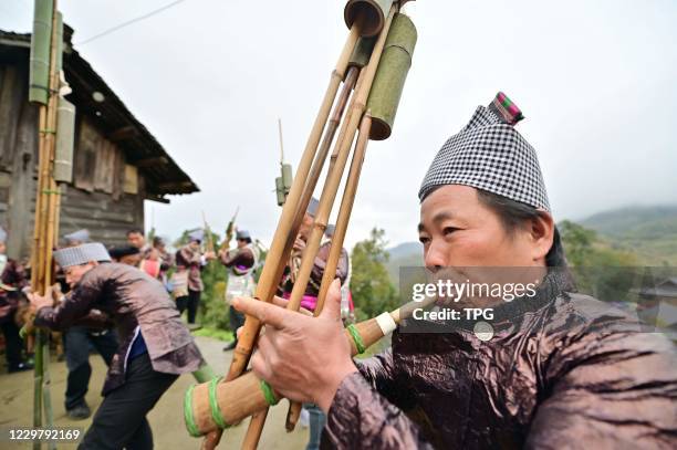 The Miao and Dong people are celebrating the traditional Reed-pipe music festival on 25th November, 2020 in Congjiang,Guizhou,China.