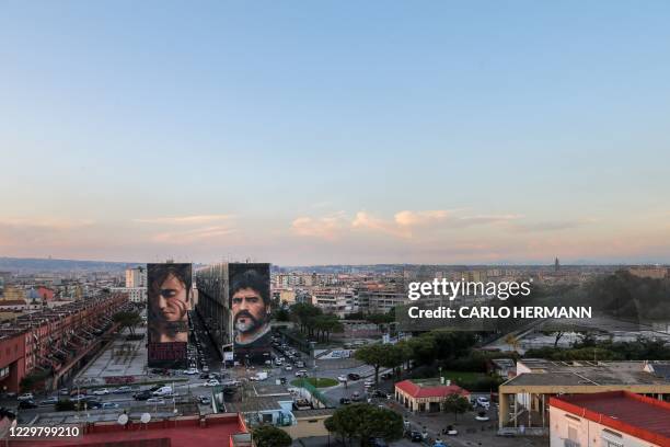 General view shows a mural of late Argentinian football legend Diego Maradona on November 26, 2020 in Naples, southern Italy. Maradona, widely...