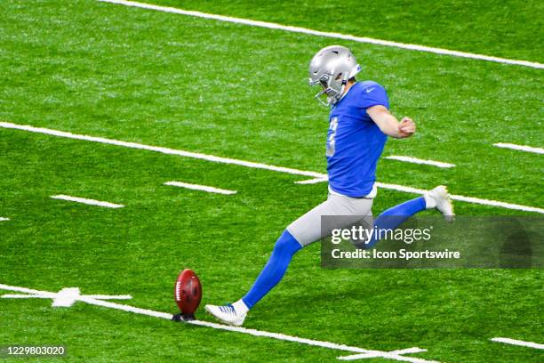 Detroit Lions punter Jack Fox kicks the opening kickoff during the Detroit Lions versus Houston Texans game on Thursday November 26, 2020 at Ford...