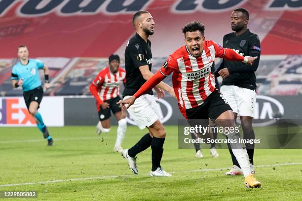 Donyell Malen of PSV celebrates 3-2 during the UEFA Europa League match between PSV v PAOK Saloniki at the Philips Stadium on November 26, 2020 in...