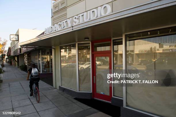 The currently closed Audacity Studio men's clothing store and barbershop on Slauson Avenue in Los Angeles, California, November 24, 2020. - It's been...