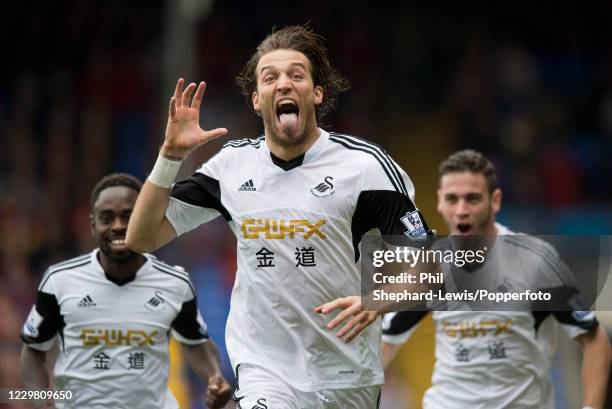 Michu of Swansea City celebrates after scoring during the Barclays Premier League match between Crystal Palace and Swansea City at Selhurst Park on...