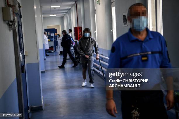 Detained Patient 1,470 Patient Walking In Hospital Hallway Stock Photos, High-Res ...