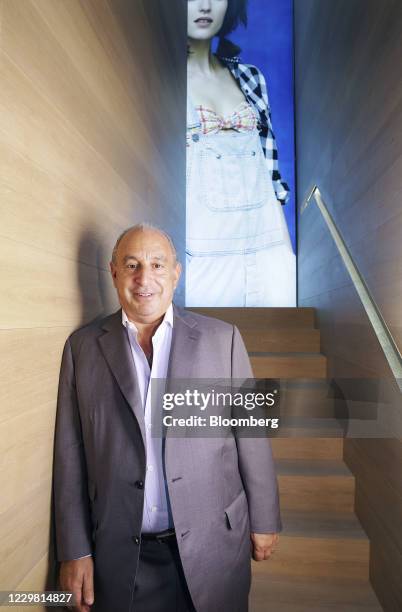 Philip Green, the billionaire owner of Arcadia Group Ltd., poses for a photograph in a new Topshop store in Central district in Hong Kong, China, on...