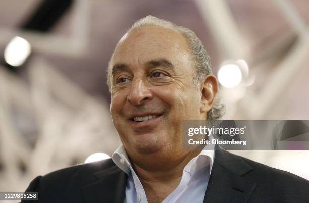 Philip Green, the billionaire owner of fashion retailer Arcadia Group Ltd., speaks during a Bloomberg Television interview inside a Topshop store on...