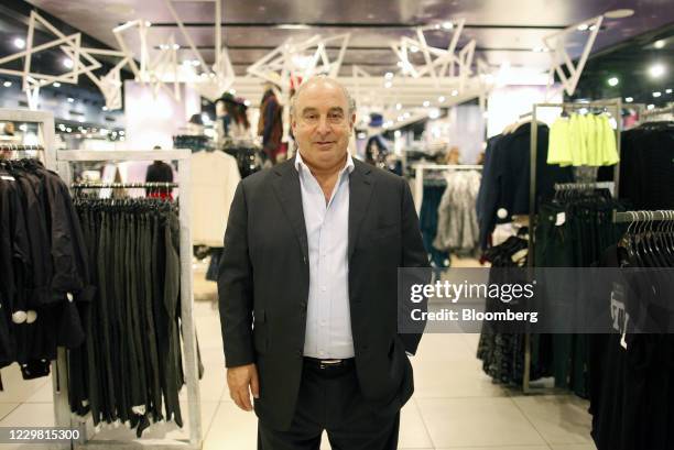 Philip Green, the billionaire owner of fashion retailer Arcadia Group Ltd., poses for a photograph following a Bloomberg Television interview inside...