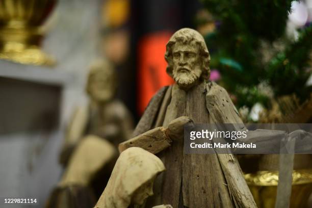 Wooden nativity scene depicting Joseph and Mary is displayed for sale in a store during Black Friday on November 27, 2020 in Rehoboth Beach,...