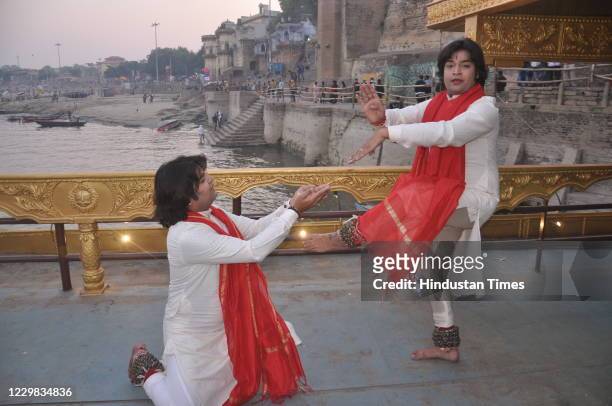 Artists during a dress rehearsal of their dance performance ahead of Prime Minister Narendra Modi's visit to Varanasi, at Tulsi ghat, on November 28,...