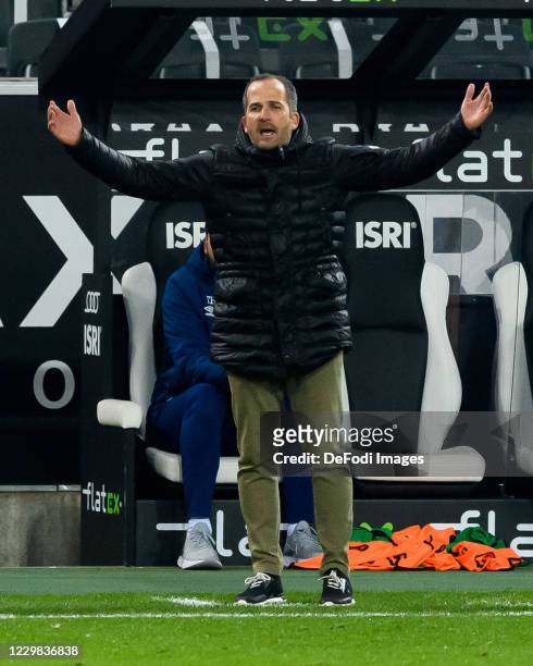 Head coach Manuel Baum of FC Schalke 04 gestures during the Bundesliga match between Borussia Moenchengladbach and FC Schalke 04 at Borussia-Park on...
