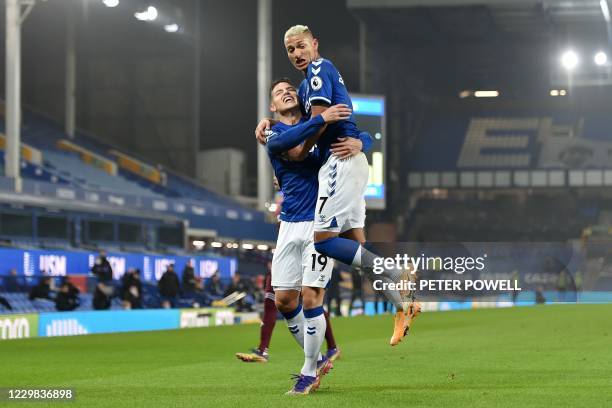 Everton's Colombian midfielder James Rodriguez celbrates scoring a goal which was then disallowed during the English Premier League football match...