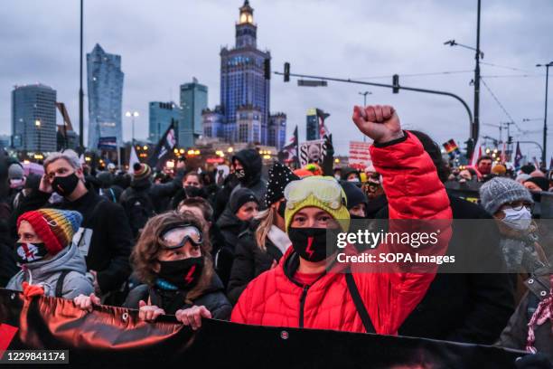 Protesters wear face masks with a Women's strike symbol on them during the demonstration. A pro-choice protest against the Constitutional Court...