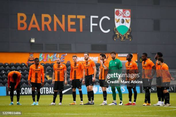 Barnet players look on prior to the Emirates FA Cup Second Round match between Barnet FC and Milton Keynes Dons at The Hive London on November 29,...