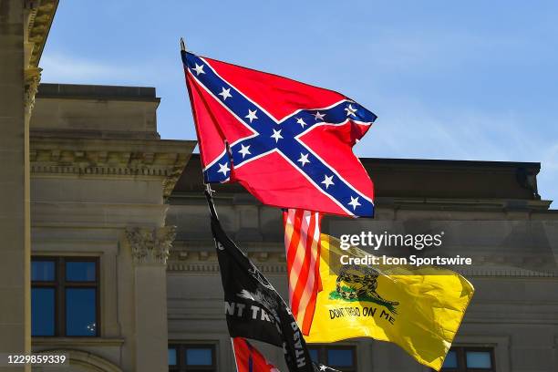 The confederate flag flies at a Stop The Steal rally in front of the Georgia State Capitol Building on November 28th, 2020 in Atlanta, GA.