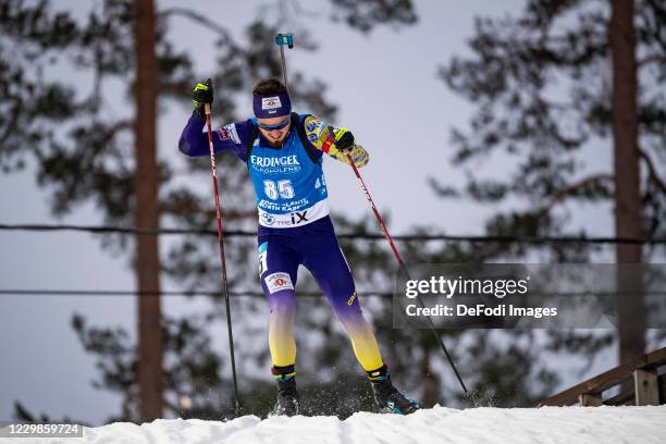 Taras Lesiuk of Ukraine in action competes during the Men 10 km Sprint Competition at the BMW IBU World Cup Biathlon Season Opening Kontiolahti on...
