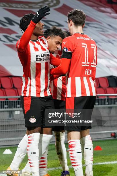 Donyell Malen of PSV celebrate his goal 1-0, penalty, Noni Madueke of PSV, Adrian Fein of PSV, during the Dutch Eredivisie match between PSV v Sparta...