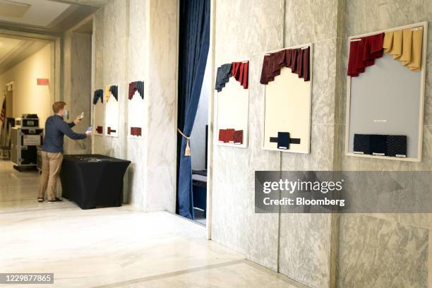 Staff member speaks during a video call as new members of Congress choose their office decor in Rayburn House Office Building in Washington, D.C.,...