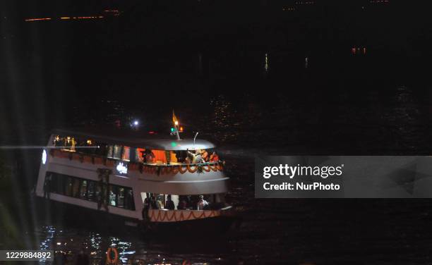 Indian Prime minister Narendra Modi arrives on Alaknanda cruise ship on Ganges river to attend Dev Dipawali festival , in Varanasi on November 30,...