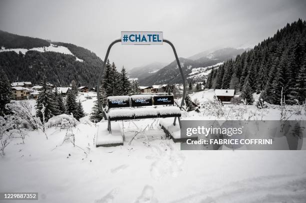 Picture taken on December 1, 2020 shows a part of ski lift used as a seat at the entrance of the French ski resort of Chatel that shares its ski area...