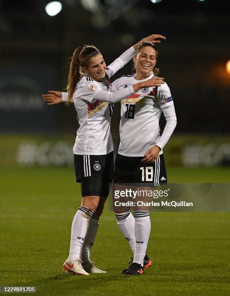 Tabea Wabmuth of Germany celebrates with team mate Melanie Leupolz after scoring during the international UEFA U21 Womens Championship Group I game...