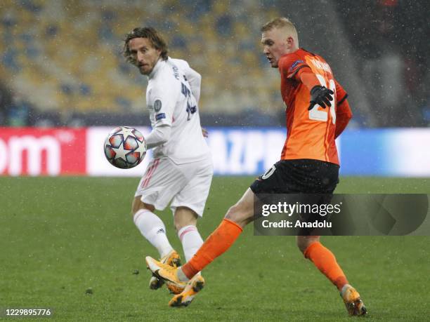 Luka Modric of Real Madrid in action against Viktor Kovalenko of Shakhtar during the UEFA Champions League group B football match between Real Madrid...