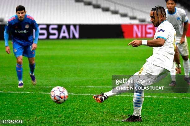 Marseille's French forward Dimitri Payet shoots a penalty kick and scores a goal during the UEFA Champions League Group C football match between...