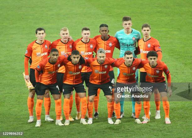 Players of Shakhtar pose for a photo ahead of the UEFA Champions League group B football match between Real Madrid and Shakhtar at Olimpiyskiy...