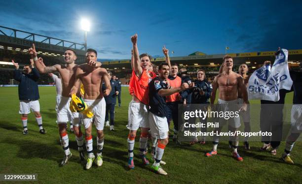 Luton Town players celebrate after the FA Cup 4th Round tie between Norwich City and Luton Town at Carrow Road on January 26, 2013 in Norwich,...