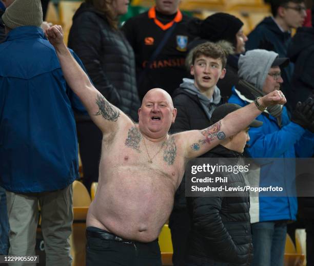 Half naked Sheffield Wednesday fan shows off his tattoos at half time during the Sky Bet Championship match between Norwich City and Sheffield...