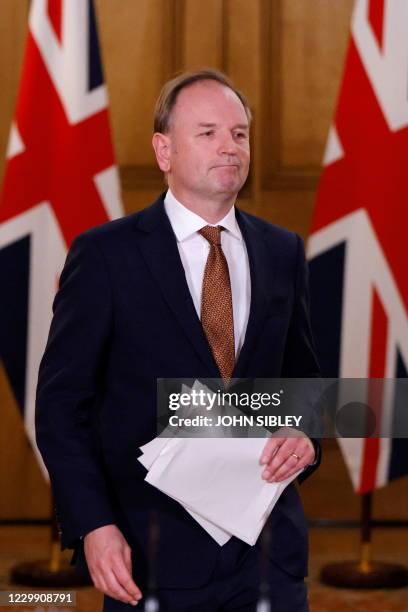 Britain's Chief Executive of the National Health Service, Simon Stevens arrives for a virtual press conference inside 10 Downing Street in central...