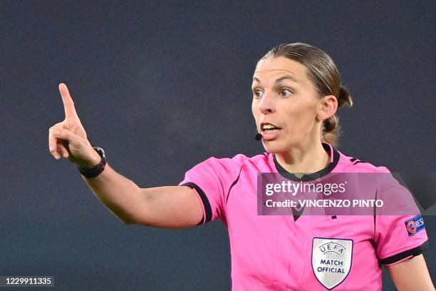 French referee Stephanie Frappart gestures during the UEFA Champions League Group G football match Juventus vs Dynamo Kiev on December 2, 2020 at the...