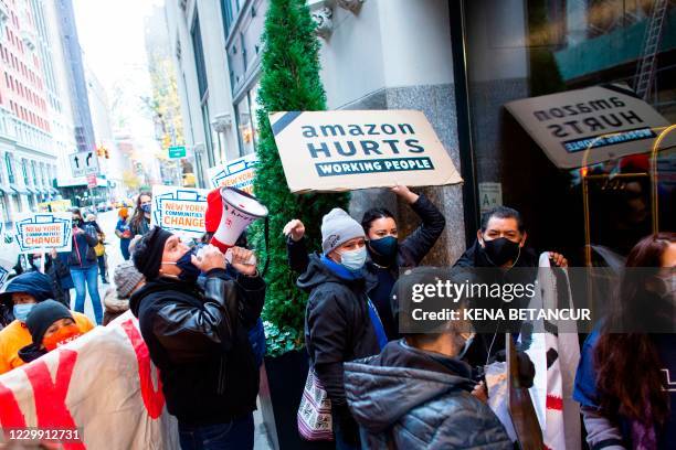 Amazon workers and community allies demonstrate during a protest organized by New York Communities for Change and Make the Road New York in front of...