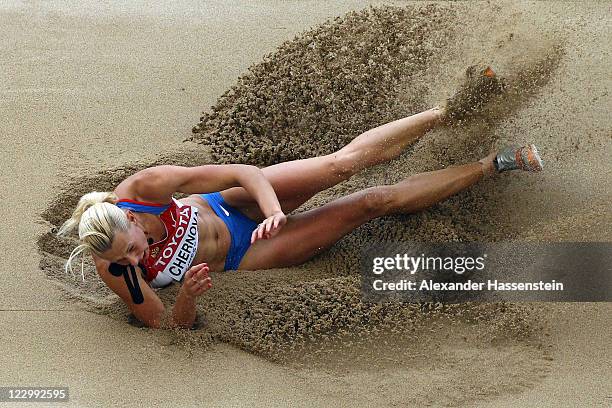 Tatyana Chernova of Russia competes in the long jump in the women's heptathlon during day four of the 13th IAAF World Athletics Championships at the...