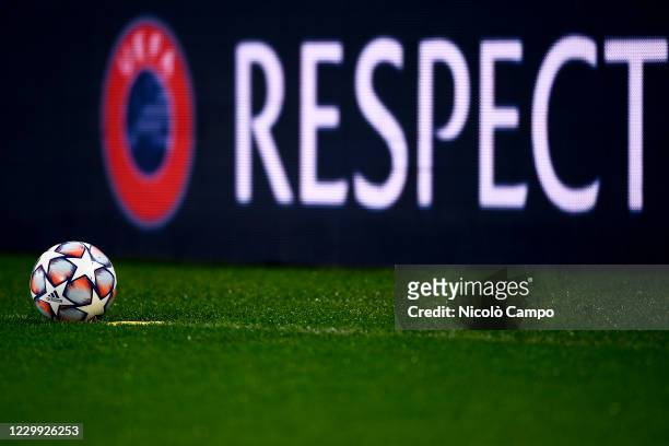 Adidas 'Finale' Champions League official match ball is seen in front of a billboard reading 'respect' prior to the UEFA Champions League Group G...