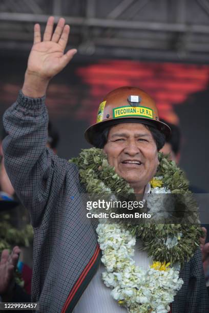 Former president of Bolivia Evo Morales waves to supporters during a welcome ceremony at Santa Rosa neighborhood on December 3, 2020 in El Alto,...