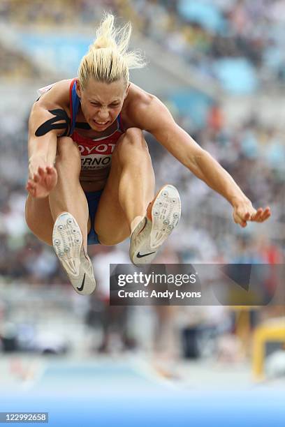 Tatyana Chernova of Russia competes in the long jump in the women's heptathlon during day four of the 13th IAAF World Athletics Championships at the...