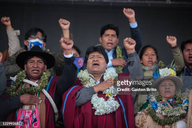 Former president of Bolivia Evo Morales rise left fist and chants during a welcome ceremony at Santa Rosa neighborhood on December 3, 2020 in El...