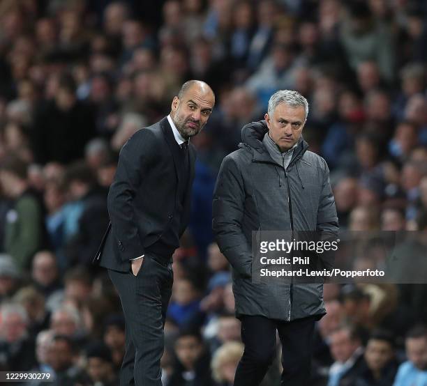 Manchester City manager Pep Guardiola and Manchester United manager Jose Mourinho both react to a decision during a Premier League match at the...