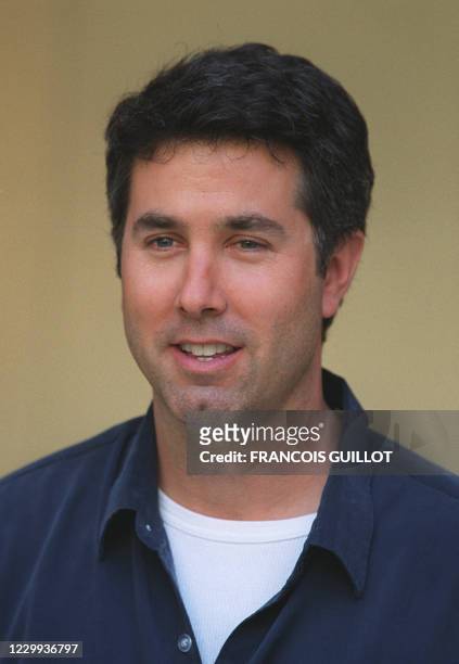 Film-maker Steve Segal answers journalists 25 August 2000 in Paris, during a press conference aimed at presenting "La famille foldingue" movie with...