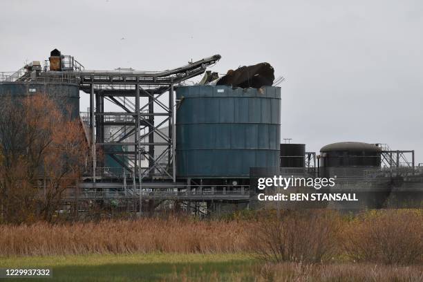 Picture shows a damaged silo at a waste water treatment plant in Avonmouth, near Bristol in southwest England on December 4, 2020 after an explosion...