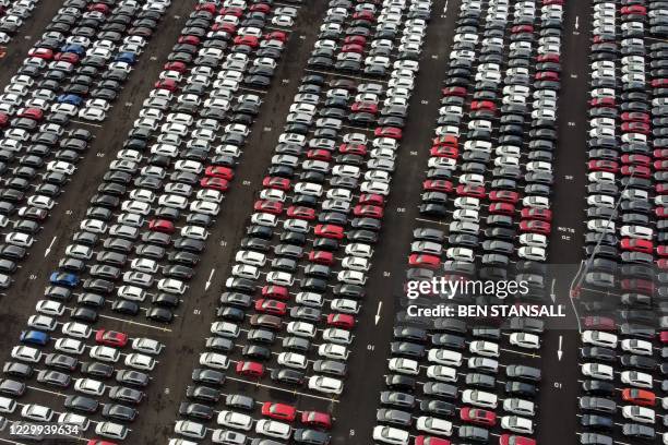 An aerial view shows lines of new Honda cars parked up at the Royal Portbury Dock in Avonmouth, near Bristol in south-west England on December 4,...